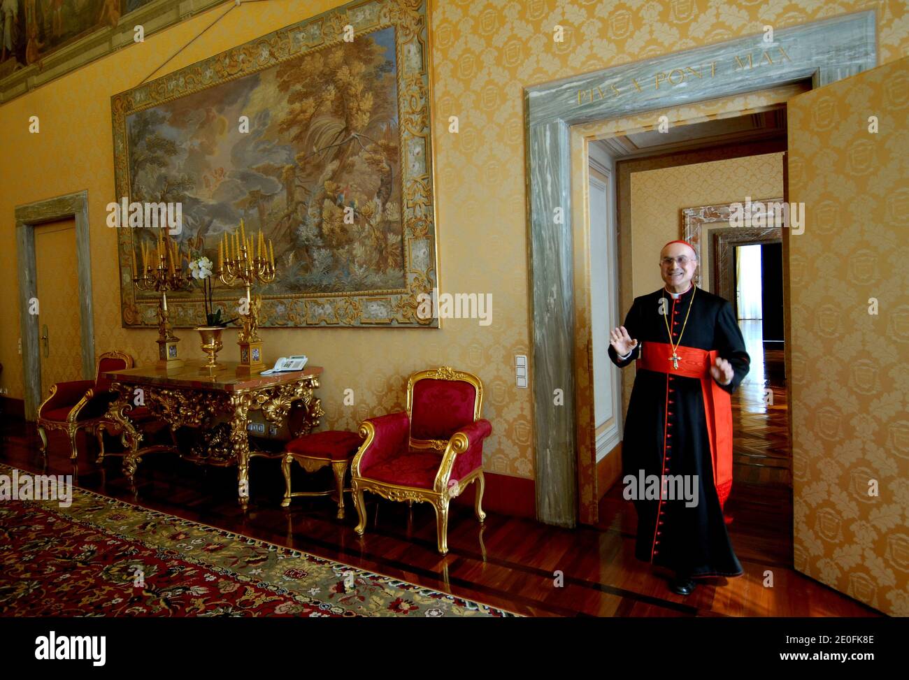 Cardinal Tarcisio Bertone , Vatican Secretary of State at the Vatican on March 17,2007. The Secretary of State is the 2nd-ranking official at the Vatican, with broad authority over the internal and external policies of the Holy See.An atmosphere of scandal shrouds the Apostolic Palace at the Vatican on May 2012. The pope's butler has been arrested in its embarrassing leaks scandal, adding a Hollywood twist to a sordid tale of power struggles, intrigue and corruption in the highest levels of Catholic Church governance. Vatican documents leaked to the press in recent months have undermined that Stock Photo