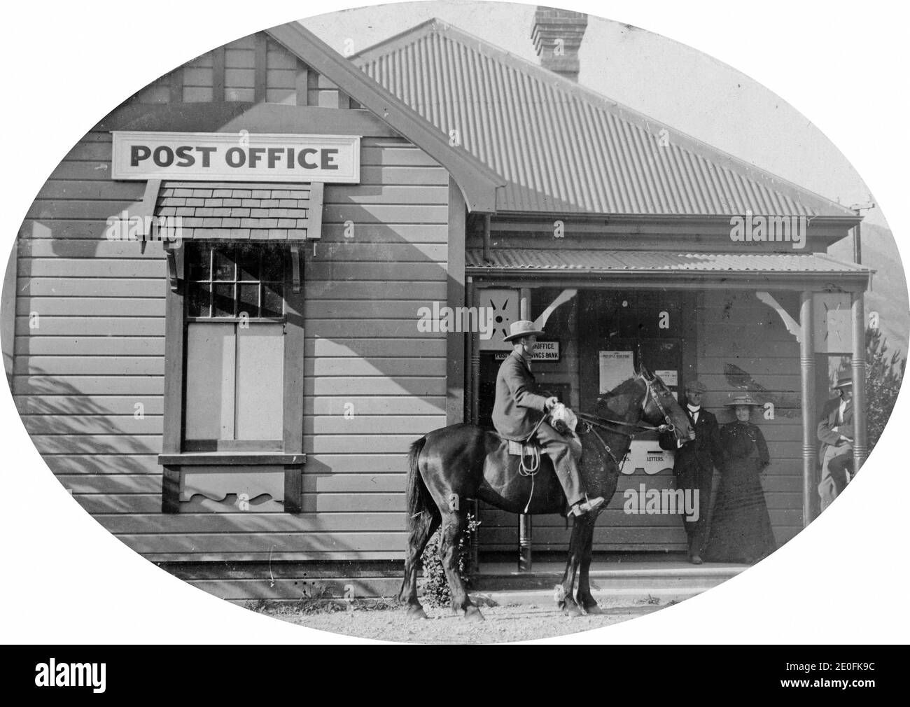 A man on horseback outside the Hanmer Springs Post Office. Image circa 1916, from the Logie family collection. Stock Photo