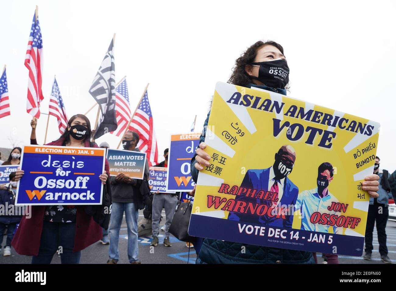 Suwanee, United States. 31st Dec, 2020. Supporters hold signs at rally for Democratic candidate for Senate Jon Ossoff meet and greet and campaign literature distribution in Suwanee, Georgia on Thursday, December 31, 2020, Photo by Tami Chappell/UPI Credit: UPI/Alamy Live News Stock Photo