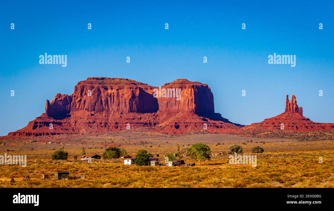 King On His Throne And Saddleback Butte In Monument Valley Navajo king-on-his-throne-and-saddleback-butte-in-monument-valley-navajo