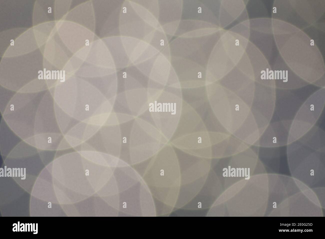 Blurred white lights on blue background. Large circles Stock Photo