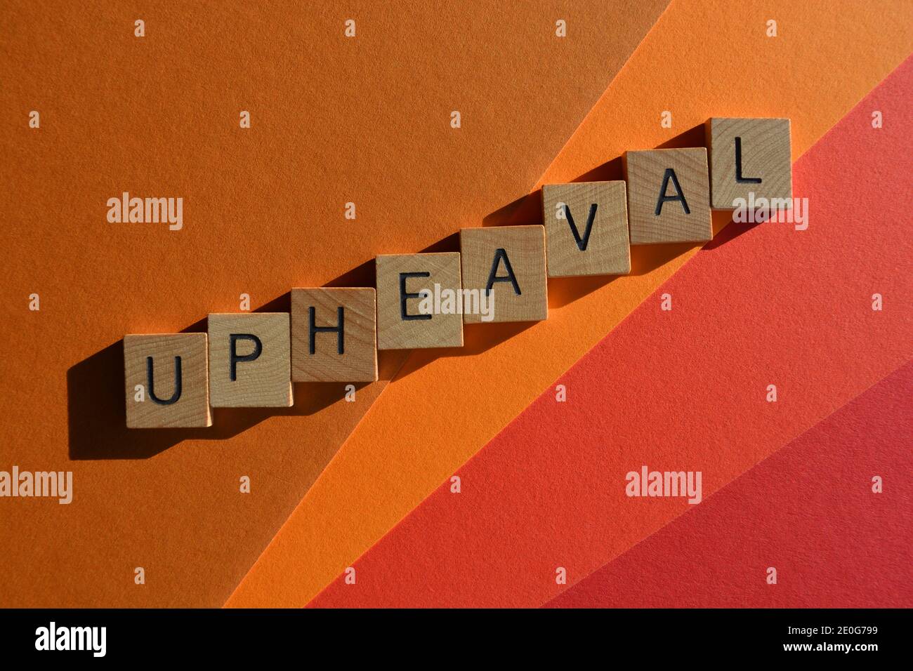 Upheaval, word in wooden alphabet letters on colourful background with copy space Stock Photo