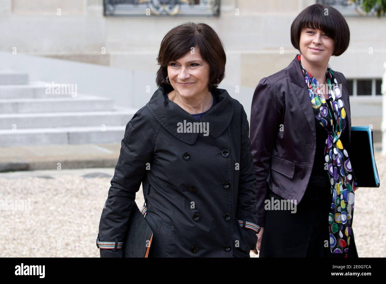 Junior Minister for Disabled People Marie-Arlette Carlotti and Junior Minister for Handicraft, Tourism and Trade Sylvia Pinel leave the presidential Elysee Palace after the weekly cabinet meeting in Paris, France on June 13, 2012. Photo by Stephane Lemouton/ABACAPRESS.COM. Stock Photo