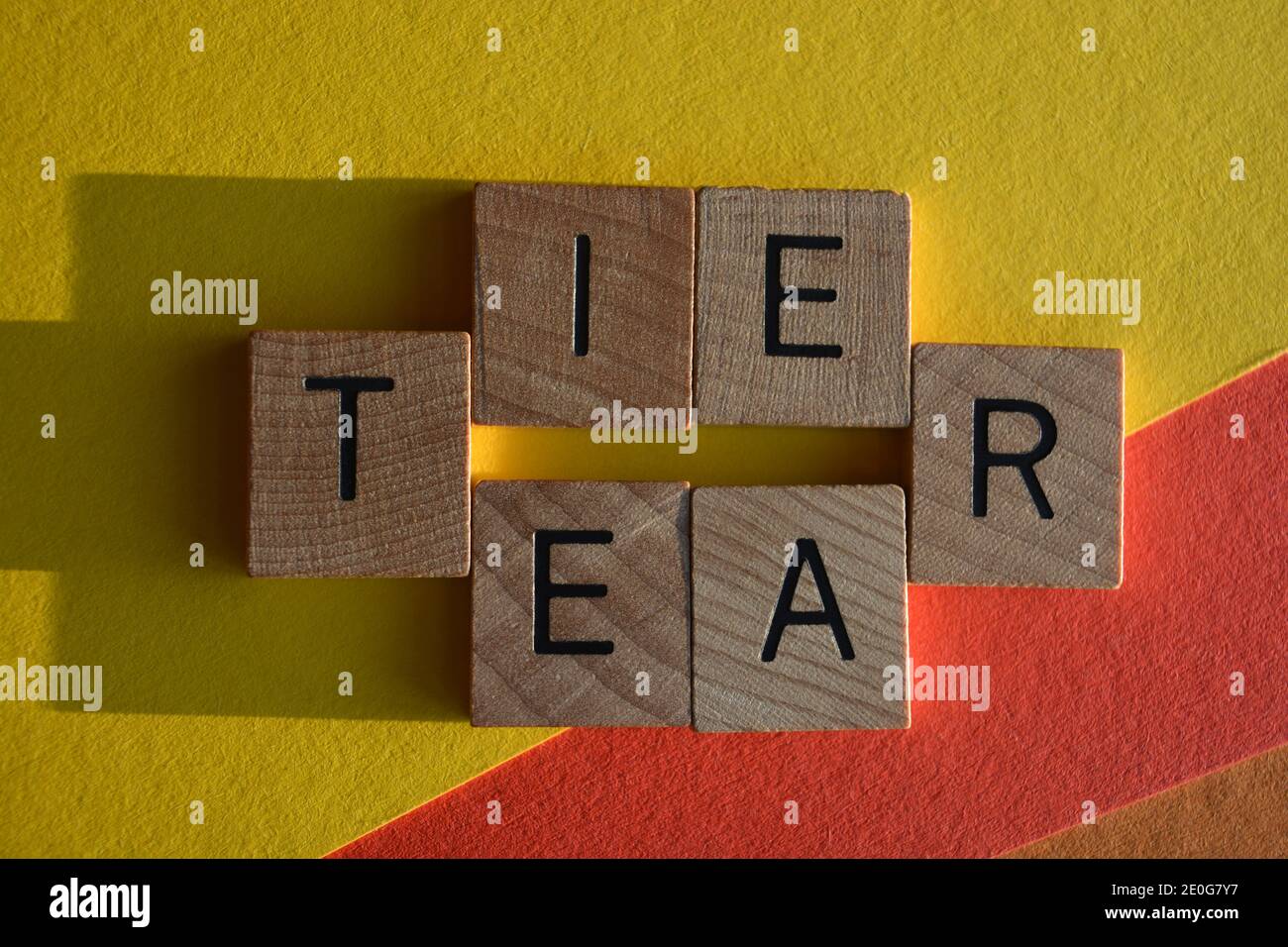 Tier, Tear, words in wooden alphabet letters on colourful background Stock Photo Alamy