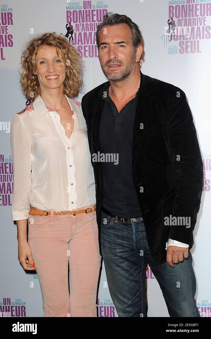 Alexandra Lamy and Jean Dujardin attending the premiere of 'Un bonheur  n'arrive jamais seul' held