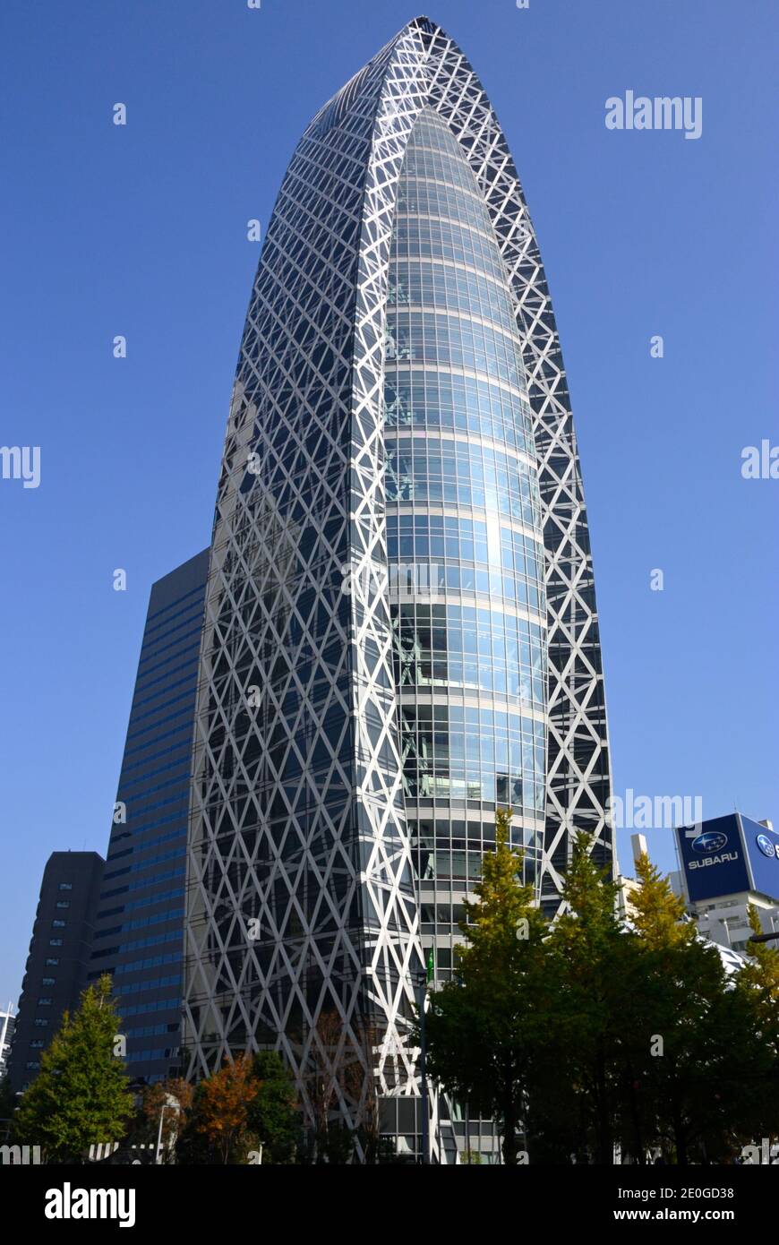 The Tokyo Mode Gakuen Cocoon tower dominates the sight of West Shinjuku, Tokyo JP Stock Photo