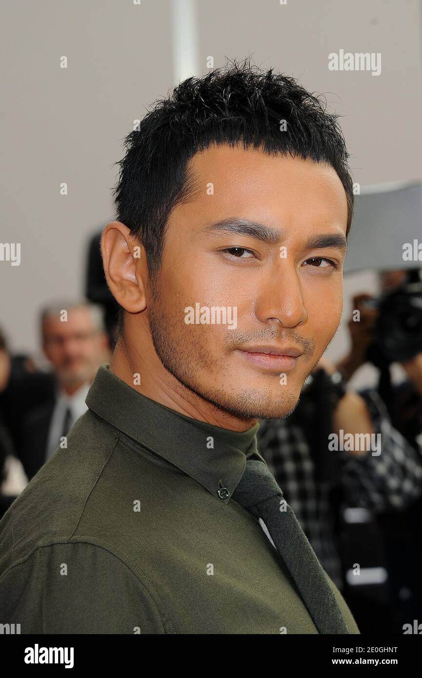 Chinese actor and singer Huang Xiaoming attending the Dior men's Spring-Summer 2013 collection show as part of the Paris Fashion Week, France, on June 30, 2012. Photo by Nicolas Briquet/ABACAPRESS.COM Stock Photo