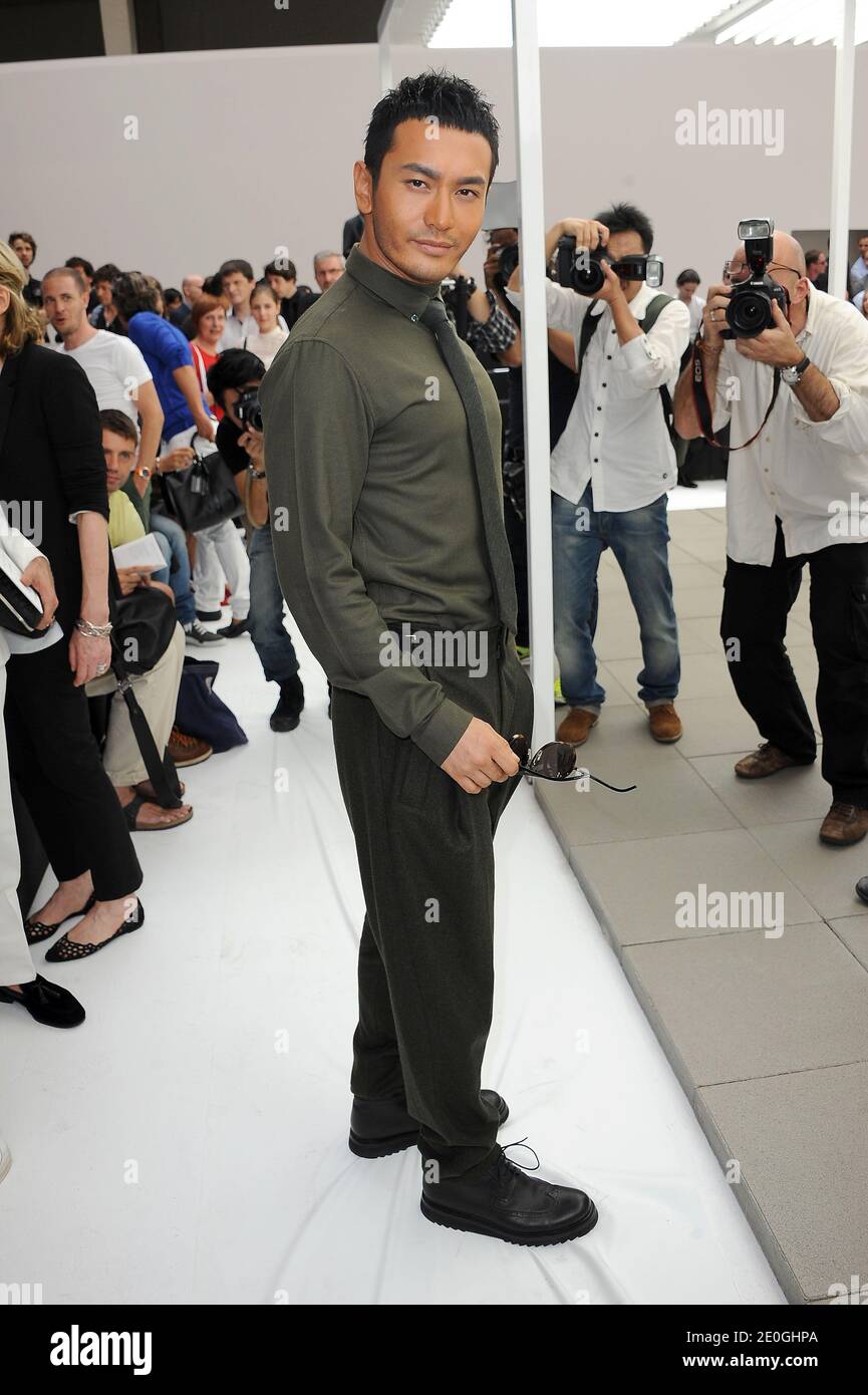 Chinese actor and singer Huang Xiaoming attending the Dior men's Spring-Summer 2013 collection show as part of the Paris Fashion Week, France, on June 30, 2012. Photo by Nicolas Briquet/ABACAPRESS.COM Stock Photo