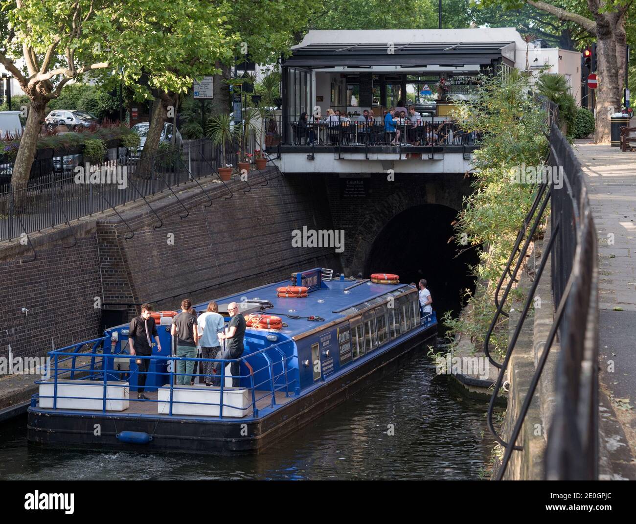 The Electric Barge, a party boat based in London's Little Venice Basin enters a tunnel under the Edgeware Road on the Regent's Canal in London, Englan Stock Photo