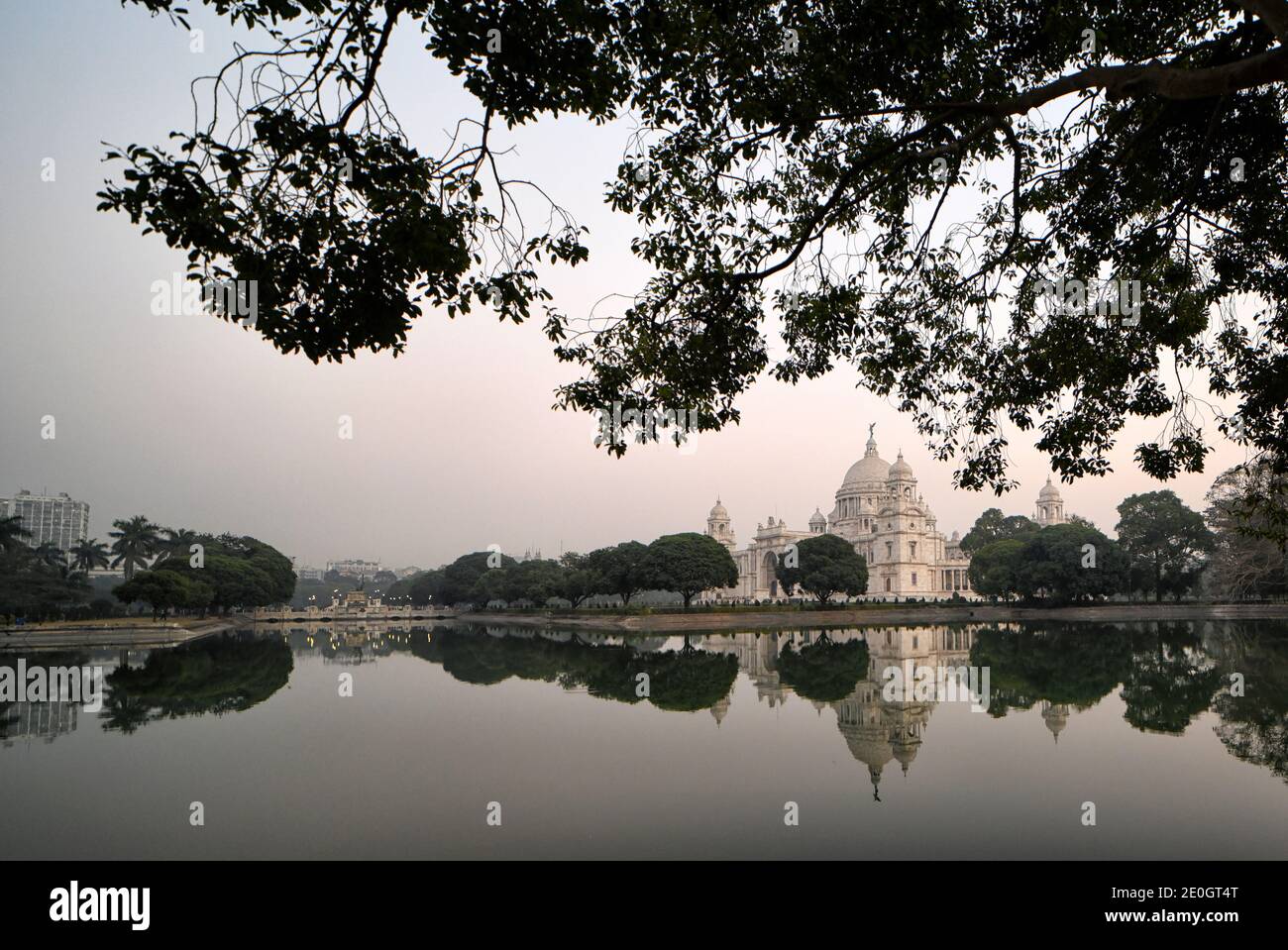 Kolkata, India. 31st Dec, 2020. Scenic beauty and the Reflection of the Victoria Memorial Hall seen outside the monument.Victoria Memorial inscribed as a World Heritage Site by UNESCO built in 1906 to 1921 in memory of Queen Victoria the Empress of India. Credit: SOPA Images Limited/Alamy Live News Stock Photo