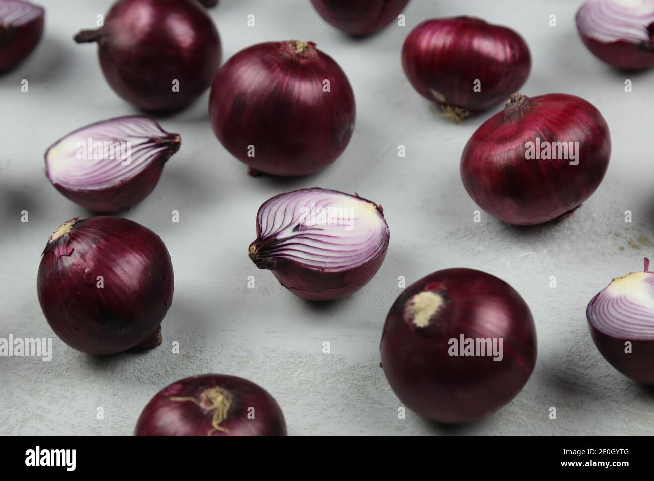 sweet red onions on background Stock Photo