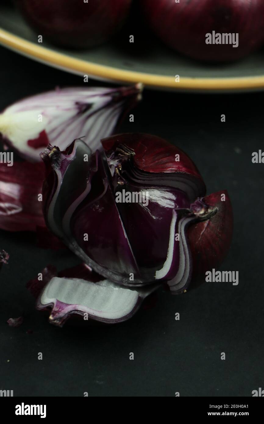 sweet red onions on background Stock Photo