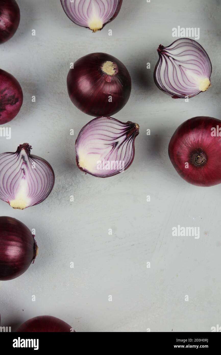 sweet red onions on background Stock Photo