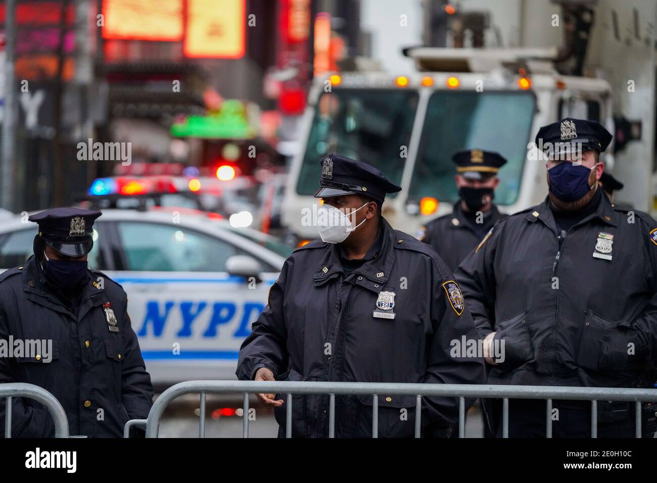New York, USA. 31st Dec, 2020. Police officers stand guard at an ...