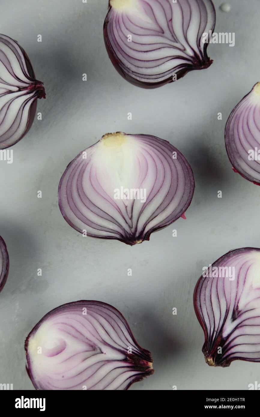 sweet red onions on background Stock Photo