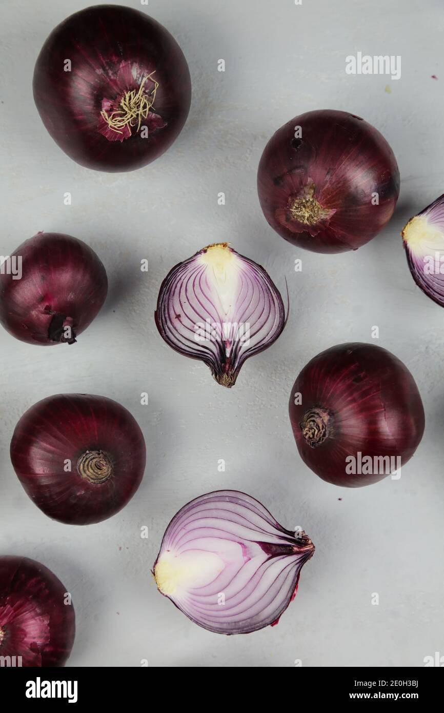 sweet red onions on background Stock Photo