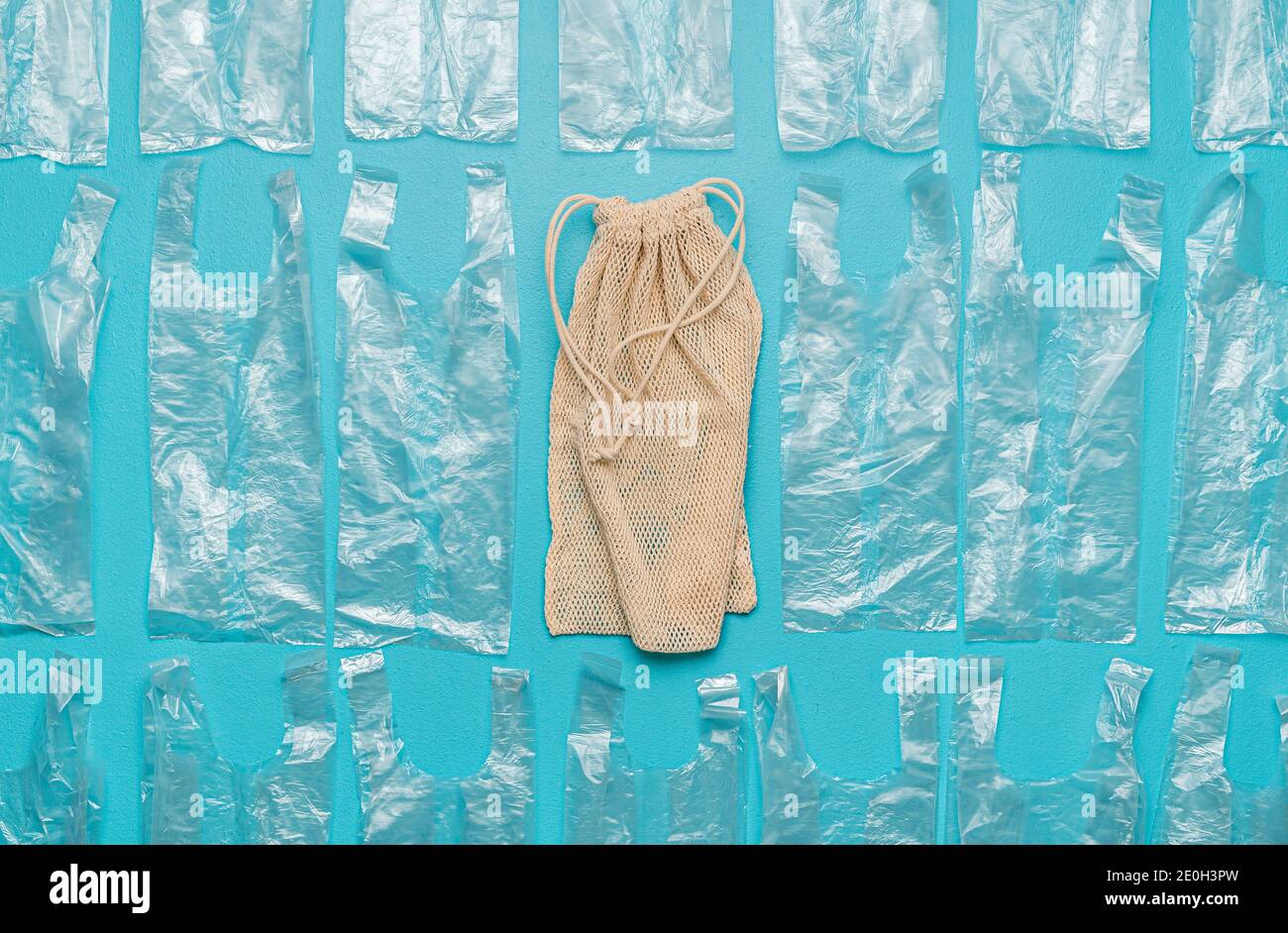 Above view with one eco bag and many plastic bags. Eco bag as an