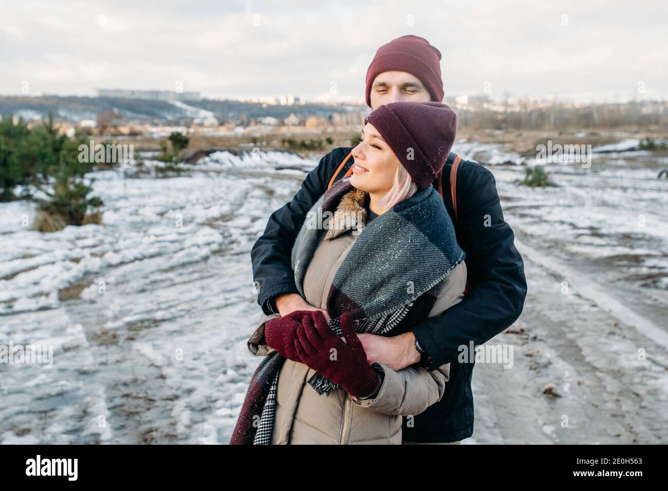 Happy loving couple walking in snowy winter, Vacation together. Young ...