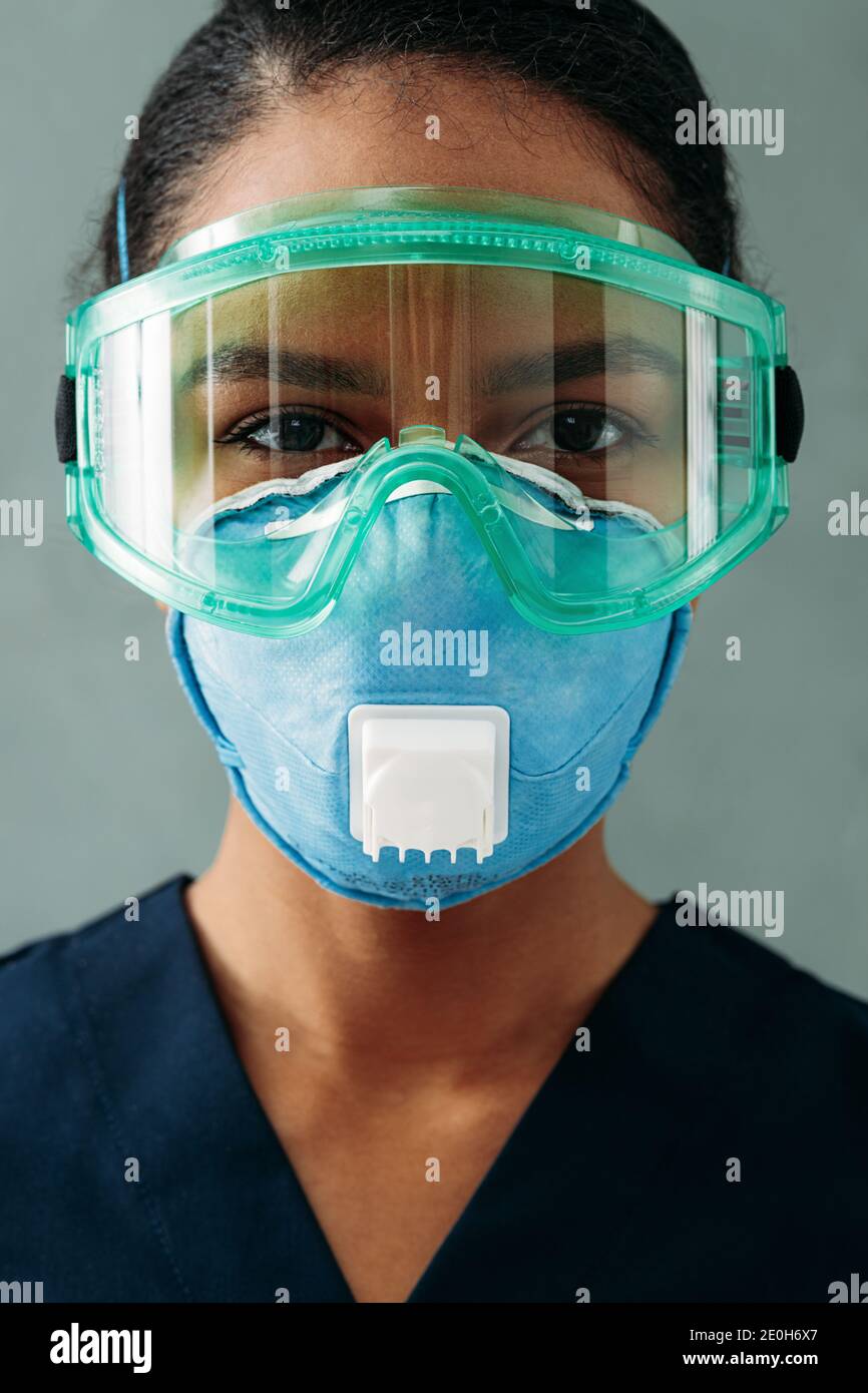 Close up woman in respirator hi-res stock photography and images - Alamy