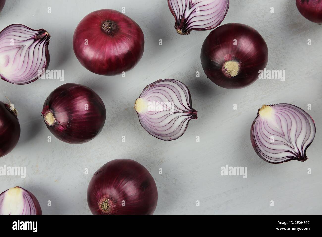sweet red onions on background Stock Photo