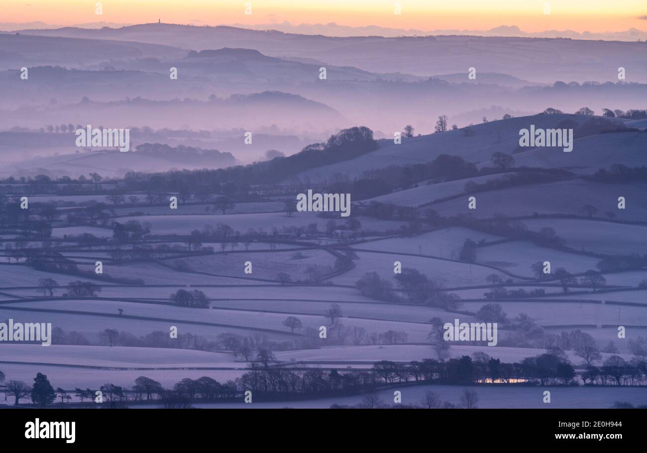Lamberts Castle, Dorset, UK. 1st Jan, 2020. UK Weather: 2021 gets off to a bitterly cold start as temperatures plummet bringing icy conditions to the South West. The rural landscape of West Dorset is coated with a layer of thick frost on New Years Day. Credit: Celia McMahon/Alamy Live News Stock Photo