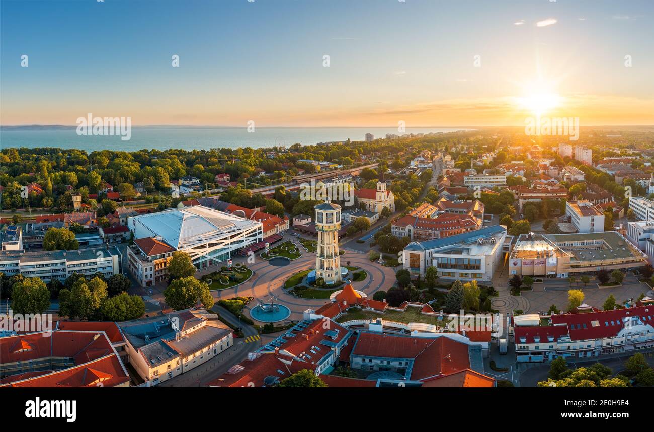 Europe Hungary Siofok Lake Balaton. Cityscape. sunset. water tower. panorama. city library. Church of the Blessed Virgin Mary in Siofok. sio plaza. Stock Photo