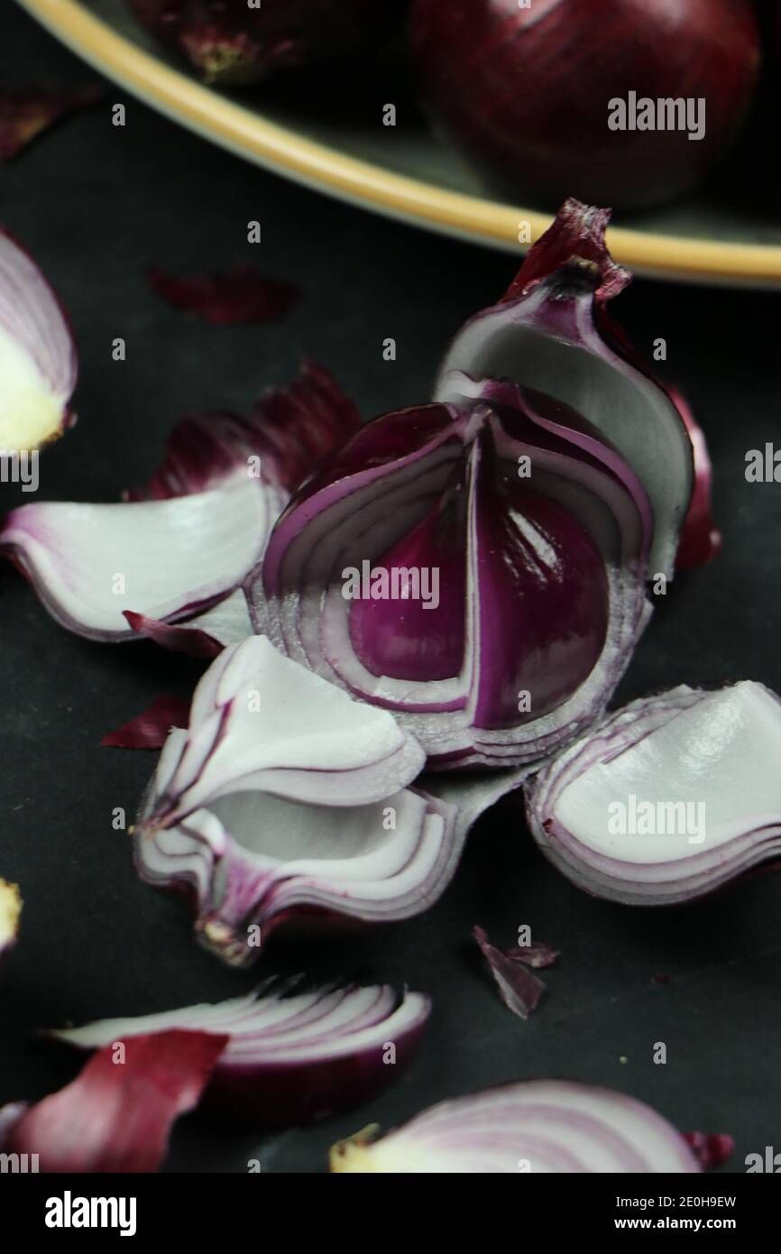 sweet red onions on background Stock Photo