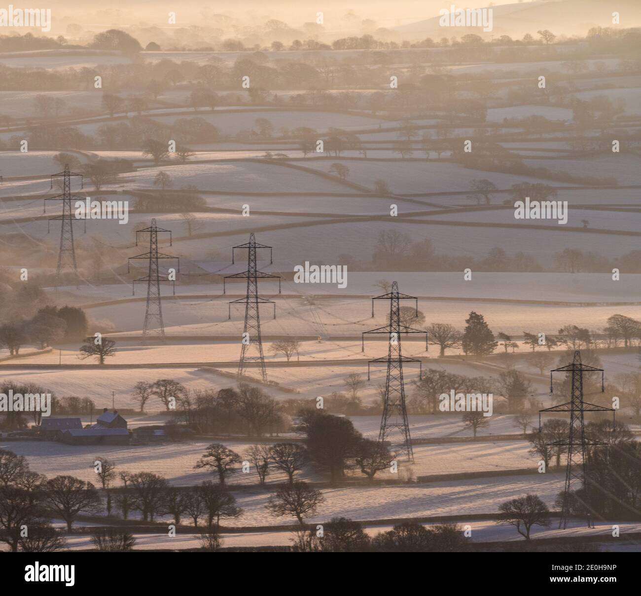Lamberts Castle, Dorset, UK. 1st Jan, 2020. UK Weather: 2021 gets off to a bitterly cold start as temperatures plummet bringing icy conditions to the South West. The rural landscape of West Dorset is coated with a layer of thick frost on New Years Day. Credit: Celia McMahon/Alamy Live News Stock Photo