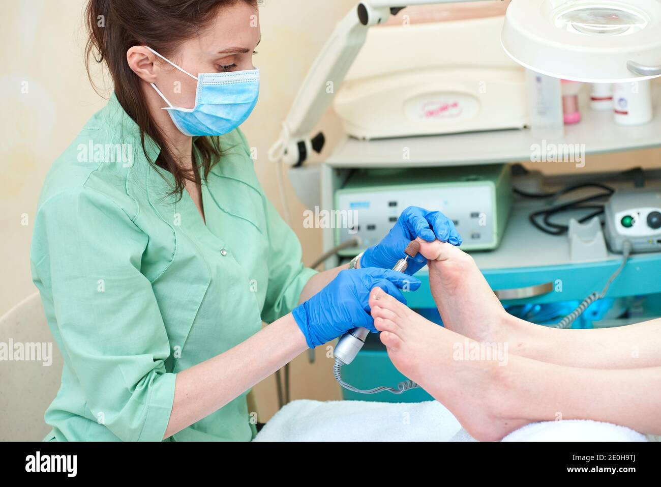 Pedicure dead skin remover foot rasp woman in nail salon Stock Photo - Alamy