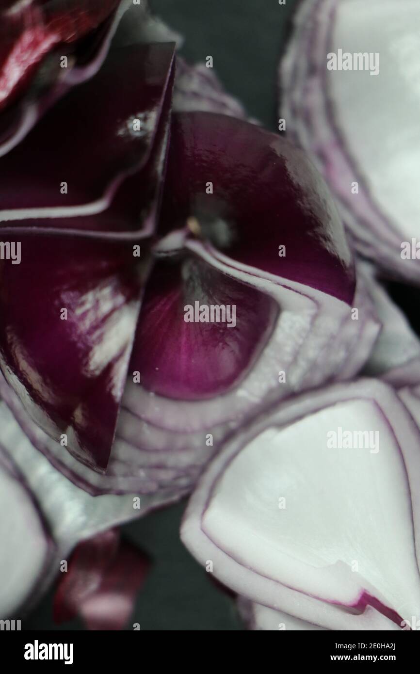 sweet red onions on background Stock Photo