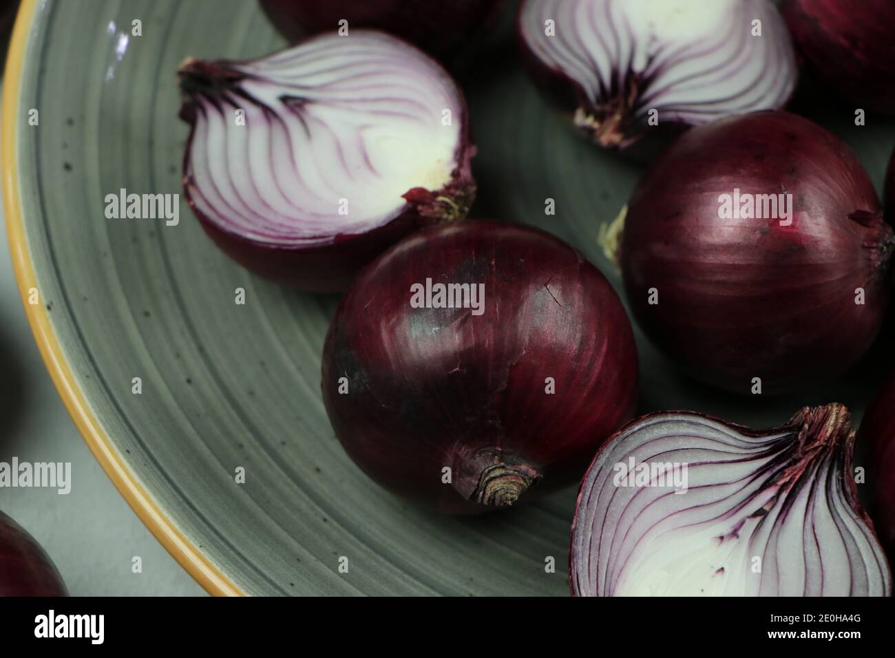 sweet red onions on background Stock Photo