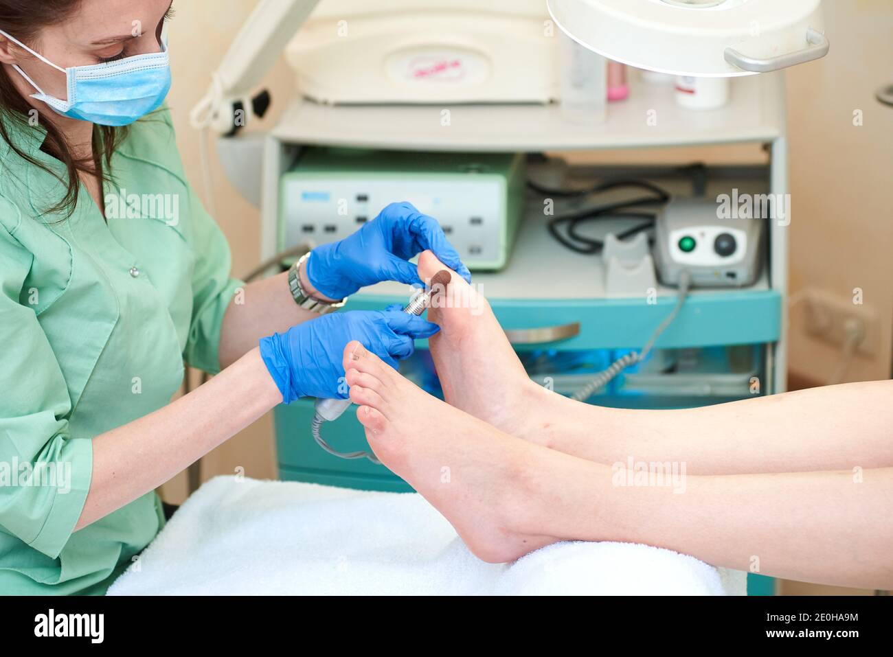 Pedicure dead skin remover foot rasp woman in nail salon Stock Photo - Alamy