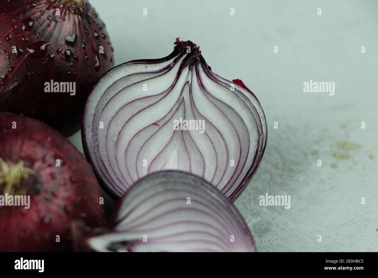 sweet red onions on background Stock Photo