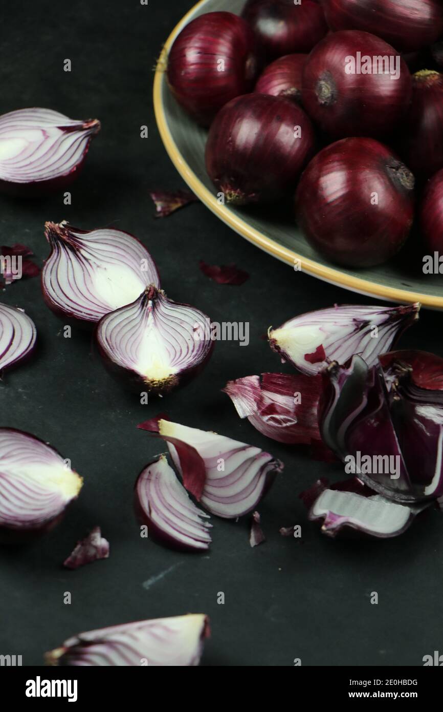 sweet red onions on background Stock Photo