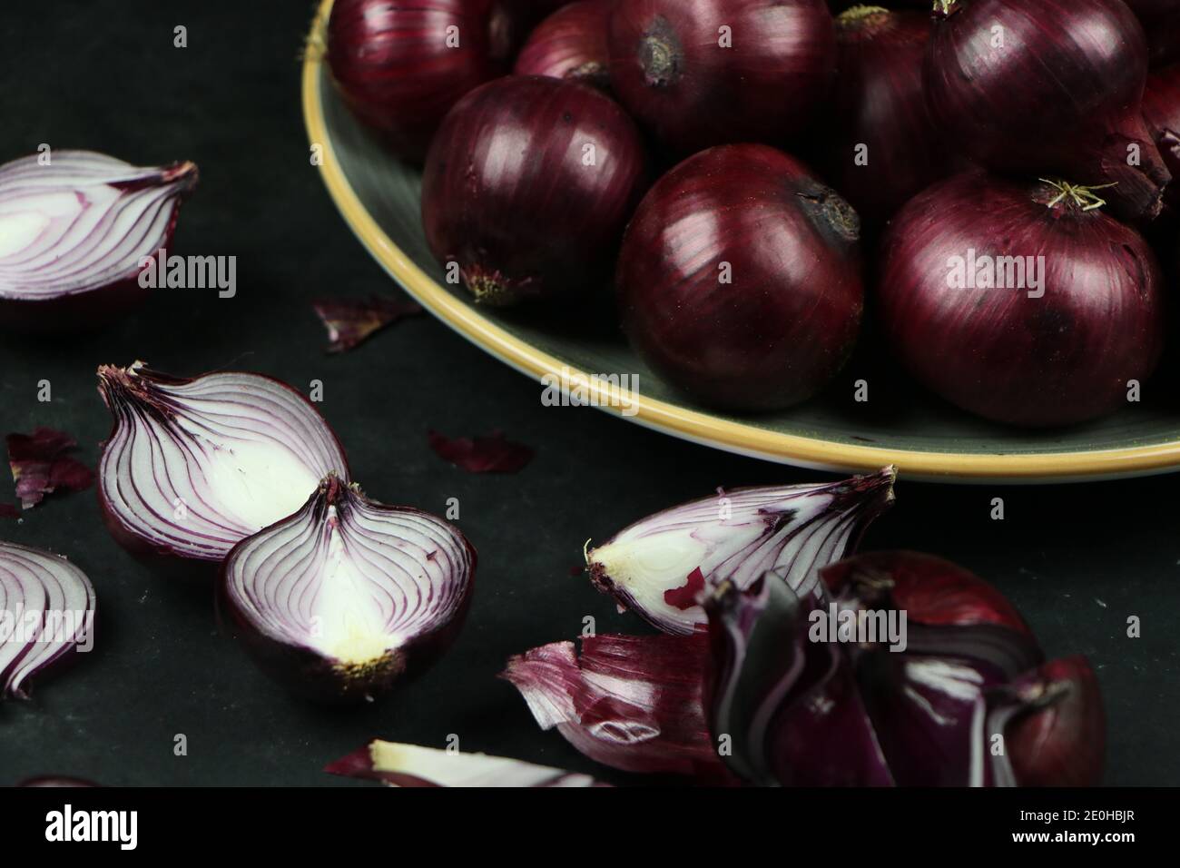 sweet red onions on background Stock Photo
