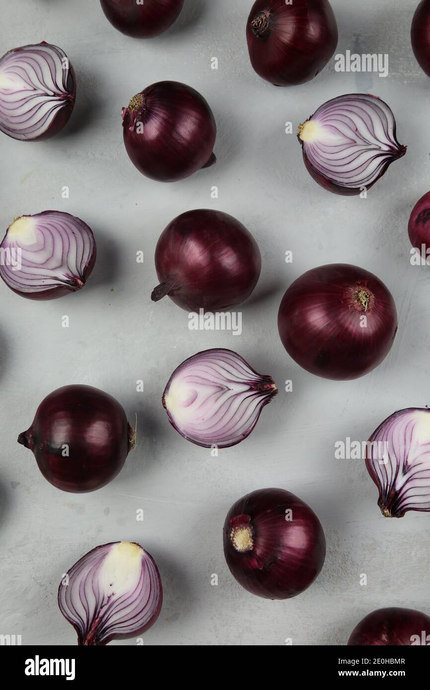 sweet red onions on background Stock Photo