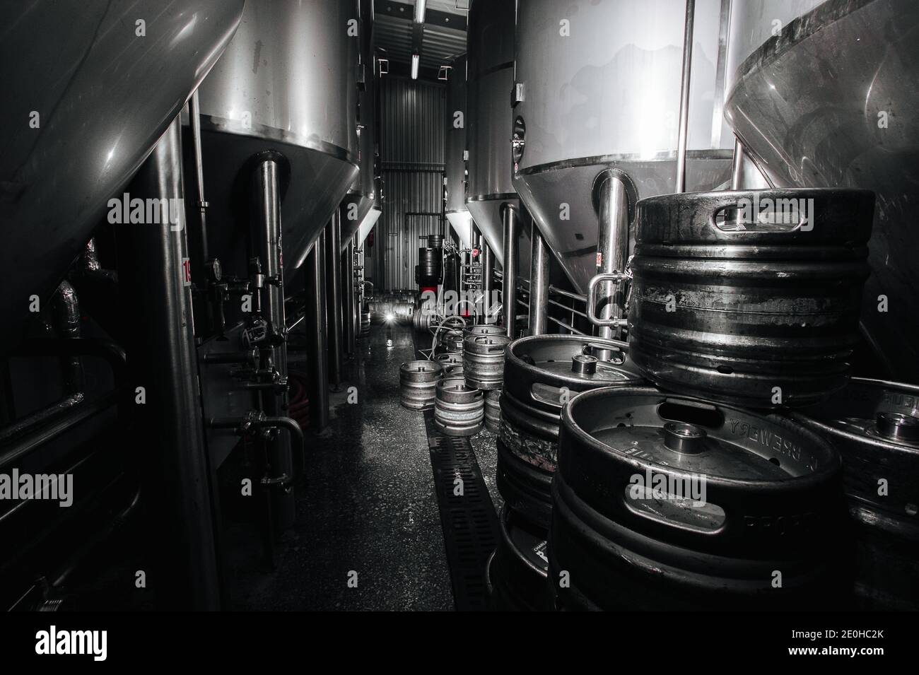 The interior of the brewery. Modern beer factory. Rows of steel ...