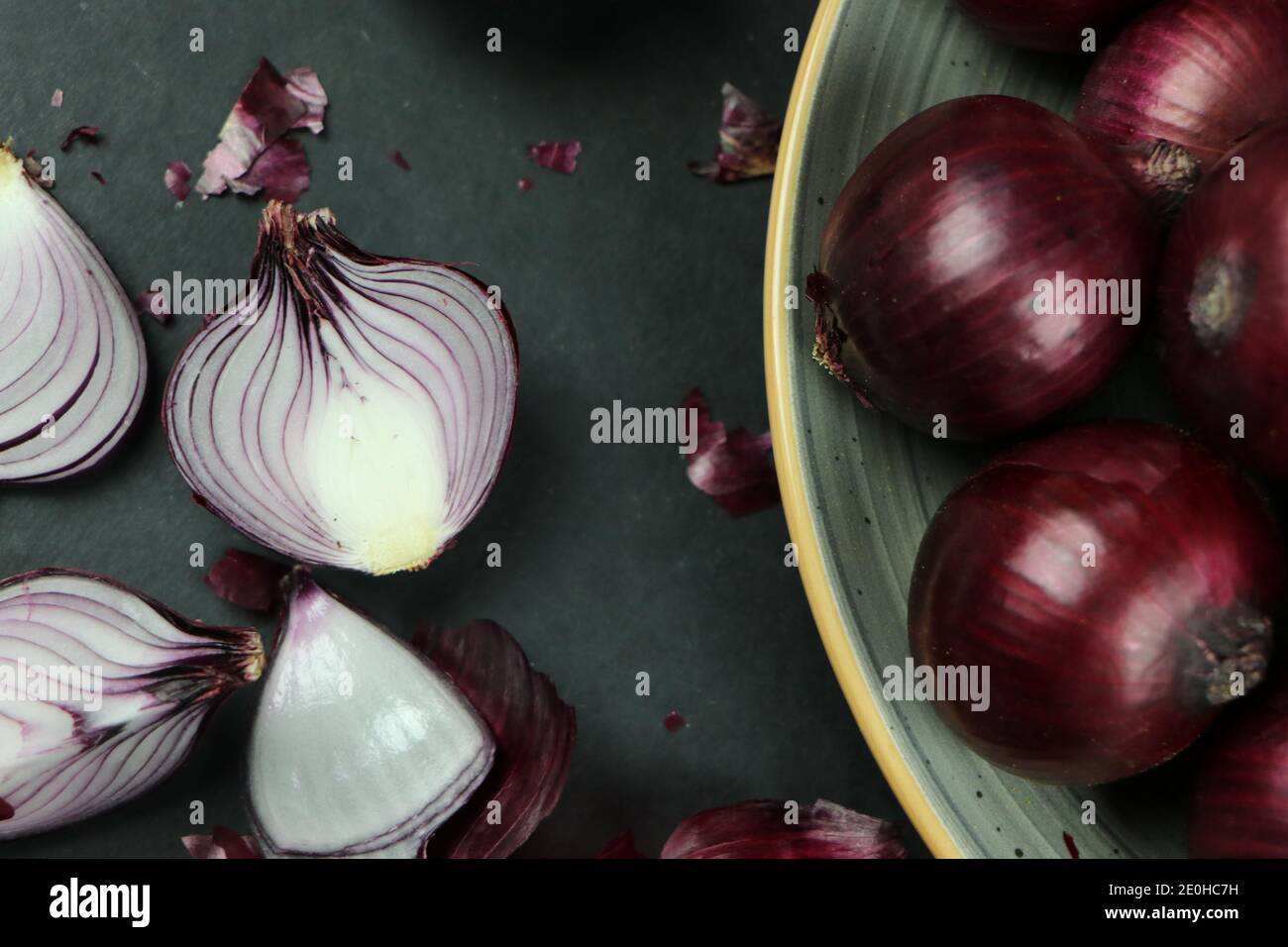 sweet red onions on background Stock Photo