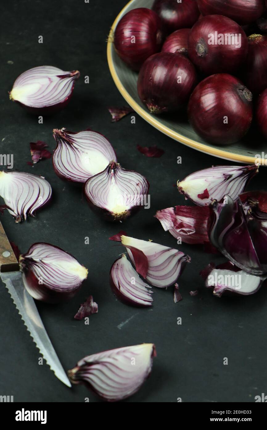 sweet red onions on background Stock Photo