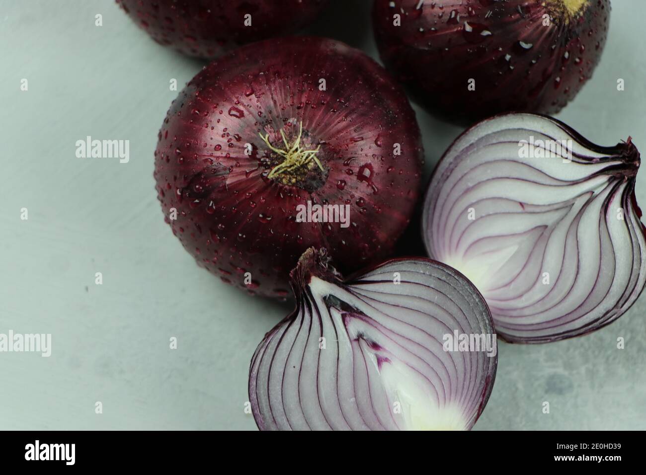 sweet red onions on background Stock Photo