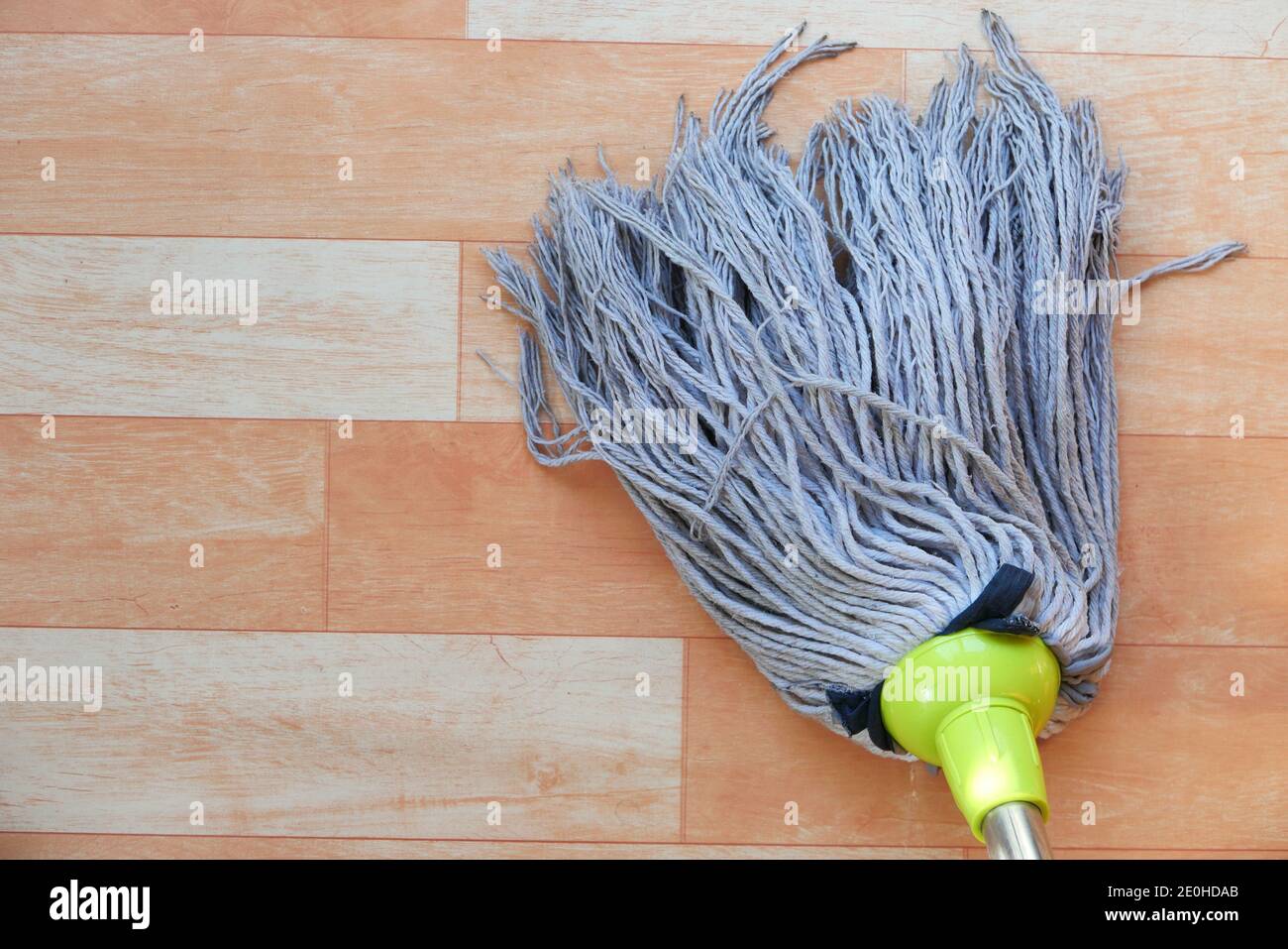 cleaning tiles floor with mop Stock Photo Alamy