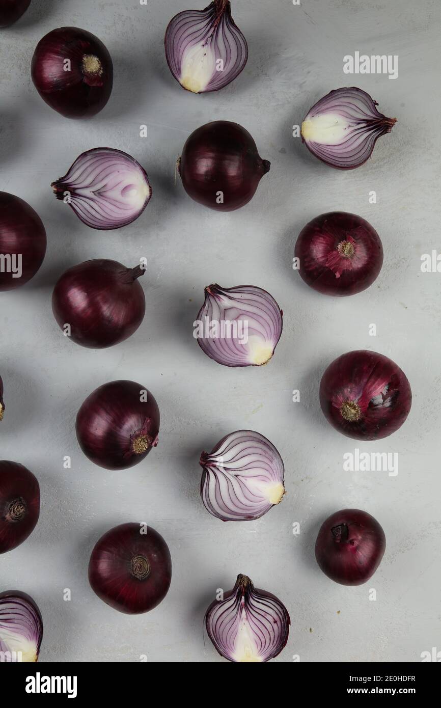 sweet red onions on background Stock Photo