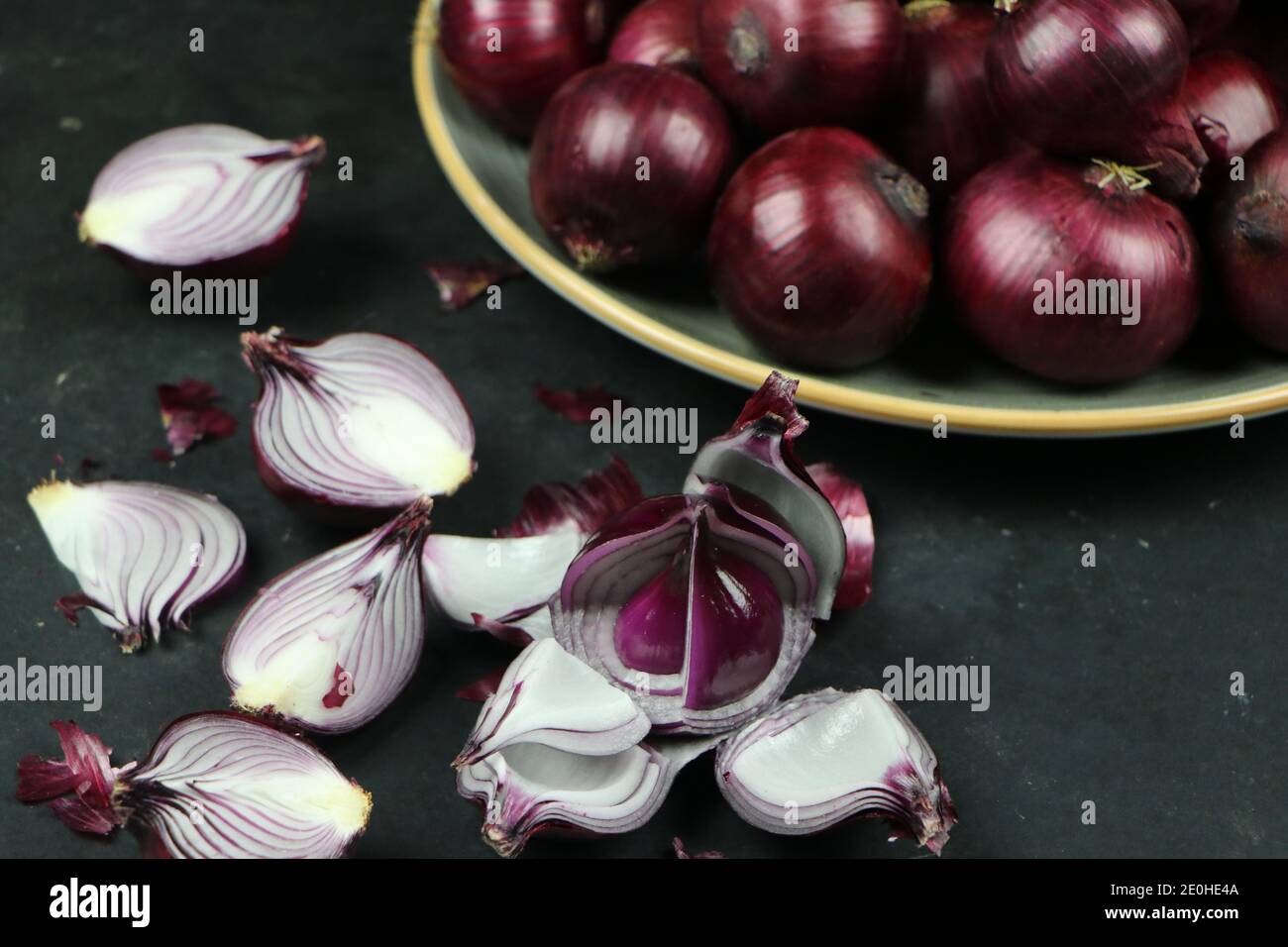 sweet red onions on background Stock Photo