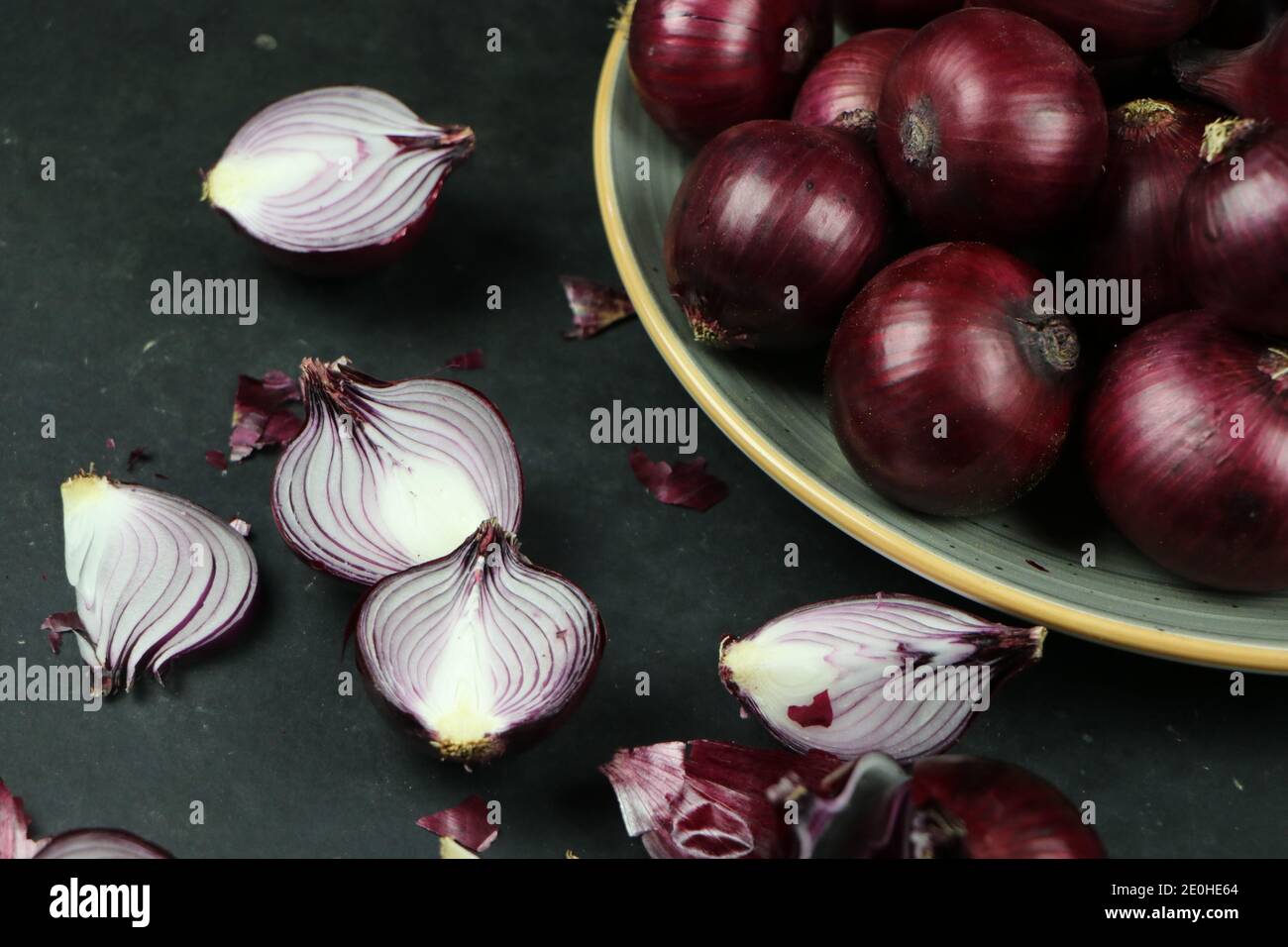 sweet red onions on background Stock Photo