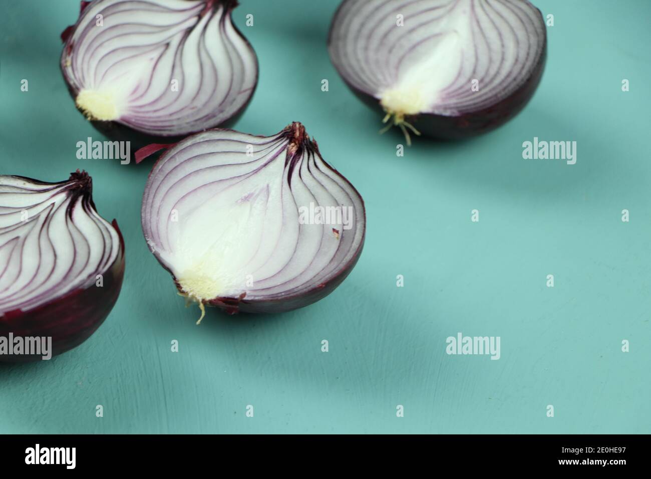 sweet red onions on background Stock Photo
