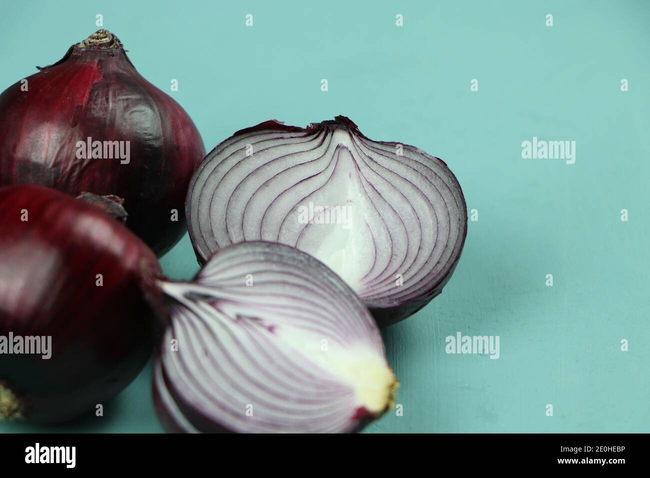 sweet red onions on background Stock Photo
