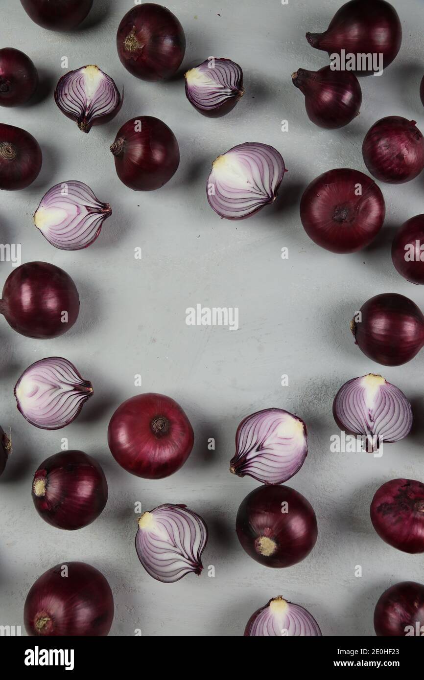 sweet red onions on background Stock Photo