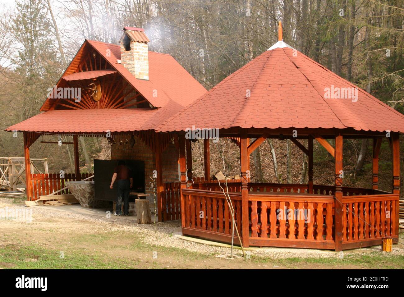 Outdoor cooking and eating area at a Bed and Breakfast business in Romania's countryside Stock Photo