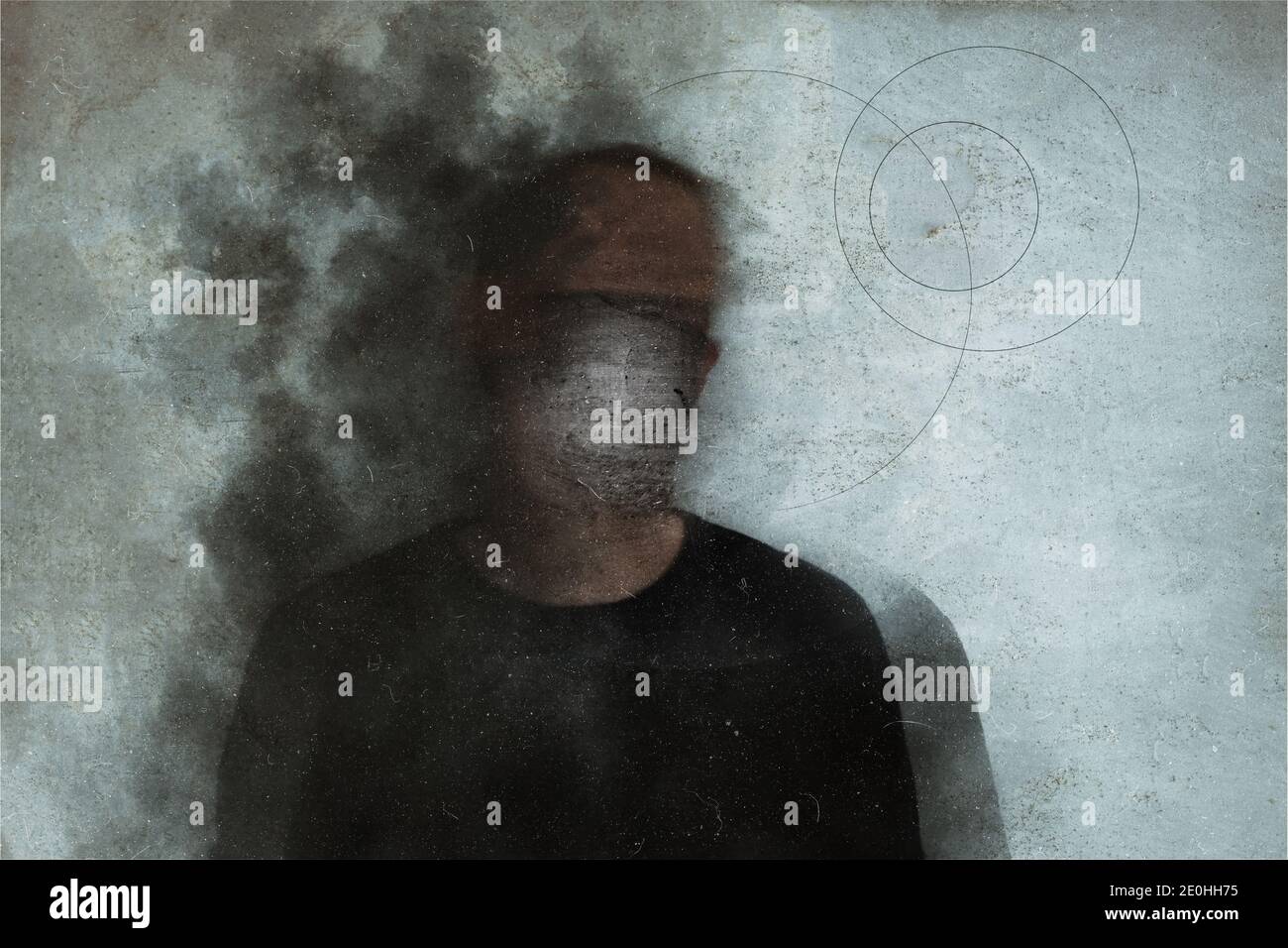 Horror and mental health concept. A mans head covered in smoke. With a blurred, grunge, abstract edit Stock Photo