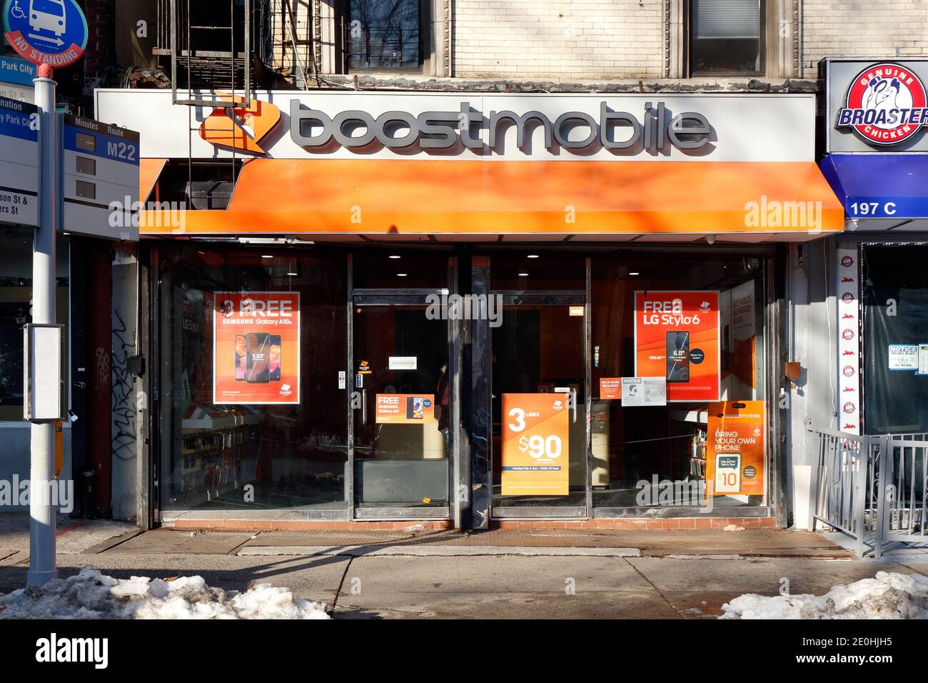 Boost Mobile, 197D Madison St, New York, NYC storefront photo of a cellphone service store in the Lower East Side neighborhood of Manhattan. Stock Photo